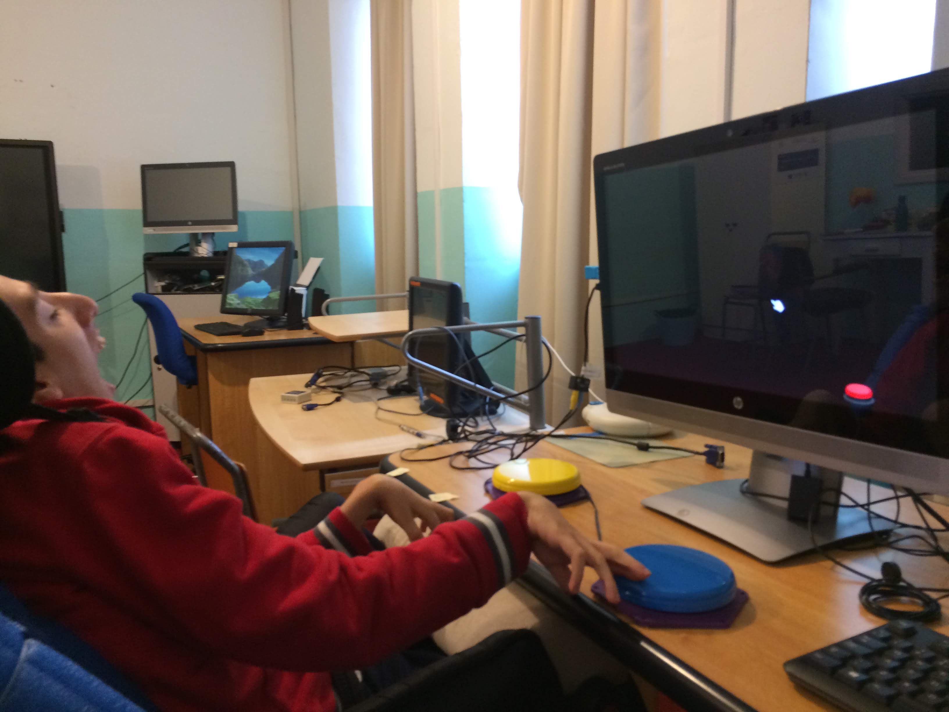 Tim using two switch to understand the concept of left and right and to enhance his waiting skills.