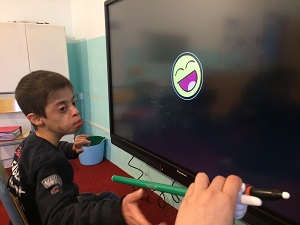 Kyle learning touch target skills on specific target.