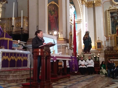 Leon and Francesco listening to Fr Glenn preach.