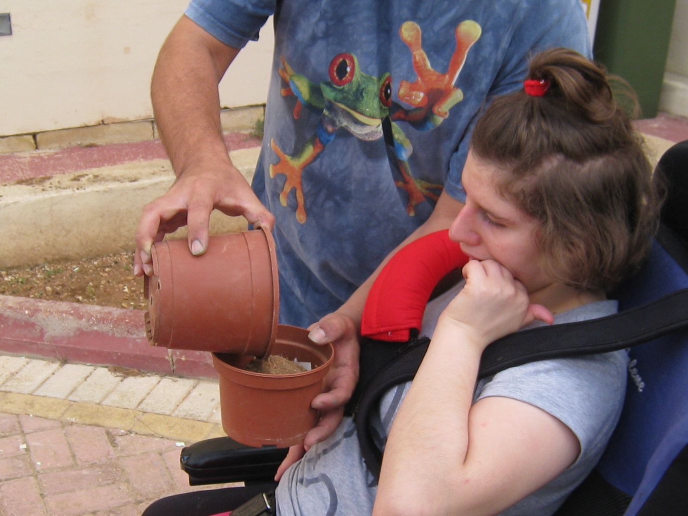 Another student exploring the soil material
