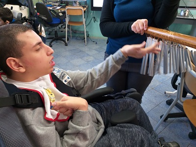 Mayren playing the chimes.