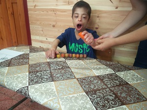 Kyle exploring the plasticine.